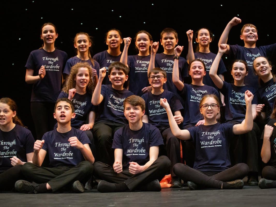 TTW members celebrating on stage